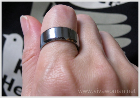 tungsten wedding band on hand